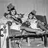 Can Can Dancers Evelyn Harding and Jolane Reynolds resting between takes, Gone with the Wind, 1939