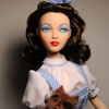 Gene Marshall doll wearing Tonner Wizard of Oz Dorothy Gale outfit with Mattel Toto