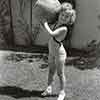 Shirley Temple with beach ball, 19th Street Santa Monica home, September 1934