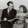 Jimmy Fidler and Shirley Temple during filming of Wee Willie Winkie, April 1937
