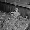 Shirley Temple attends the Holy Land model presentation at the Shrine Auditorium, April 14, 1937