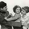 Michael Whalen, Shirley Temple, and June Lang, Wee Willie Winkie, 1937