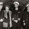 Lt. Commander Joel Pressman, Claudette Colbert, Captain Don Wilcox, Commander Michael Sanchezat at the Since You Went Away Carthay Circle premiere, July 18, 1944