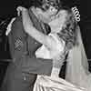 Shirley Temple and John Agar drink champagne after their wedding, September 19, 1945