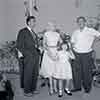 Mickey Hargitay, Jayne Mansfield, and Art Linkletter on the Storybook Land attraction at Disneyland, May 1957
